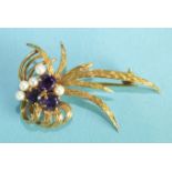A 9ct yellow gold spray brooch set amethysts and pearls, 4.2cm long, 5.4g.