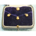 A cased set of four 9ct gold collar studs, 3.3g.