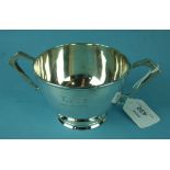 A 20th century silver porringer of plain form, on circular foot, Carrington & Co, London 1927, 8cm