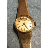 Eterna, a ladies 9ct gold wrist watch, the gold dial with baton numerals in 9ct gold case on