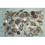 A quantity of mainly silver and white metal brooches, medallions, rings, etc,