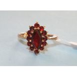 A garnet marquise cluster ring with 9ct gold mount, size M 1/2, 3g.