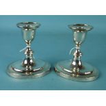 A pair of short loaded candlesticks on oval bases, 12cm high, Sheffield 1898.