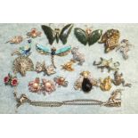 A quantity of costume jewellery in the form of animals, birds and insects.