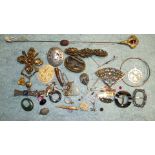 A gilt metal hat pin, a marcasite and paste brooch and other items.