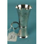 A silver double-ended spirit measure with reeded finger loop, 10cm high, Birmingham 1956, ___1.8oz.