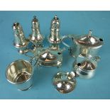 A quantity of silver cruets including a Goldsmiths and Silversmiths silver mustard pot with blue
