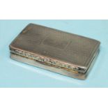 A Victorian engine-turned snuff box, the cartouche engraved "DAC", with gilt interior, 7cm long,