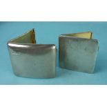 Two engine turned silver cigarette cases, ___6oz.