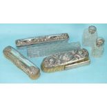 A collection of various dressing table items, comprising two silver topped scent bottles with