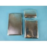 An engine-turned silver cigarette case, Birmingham 1937 and two other silver cigarette cases, (one