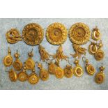 Three Victorian gilt metal Etruscan style brooches with tassels, another brooch and eight pairs of