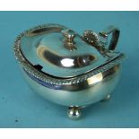 A George III silver mustard pot by Charles Fox, of oblong bellied form on ball feet with glass