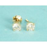 A pair of diamond ear studs, the brilliant cut diamonds four-claw set in 14k gold post fittings, 0.