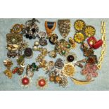 A quantity of costume jewellery, some signed by Napier, Givenchy, Boucher, Trifari, etc, mainly