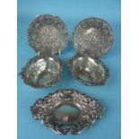 A pair of silver bon bon dishes embossed with cherubs, (one af), Birmingham 1897, another plainer