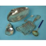 An American silver bon bon dish in the form of a clam shell, on ball feet, stamped Wallace,