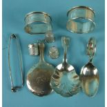 A fiddle pattern silver caddy spoon with shell bowl, Exeter 1858, a miniature silver hand mirror,