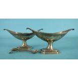 A pair of slender boat shaped salts, on stretched octagonal feet, 12.5 x 6.5cm, Sheffield 1855 and a