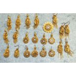 A Victorian gilt metal brooch set paste, four pairs of similar earrings, six other pairs of gilt