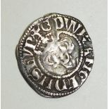 An Edward I hammered silver penny.