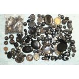 A large quantity of jet and other beads, plaques, etc, (some af).