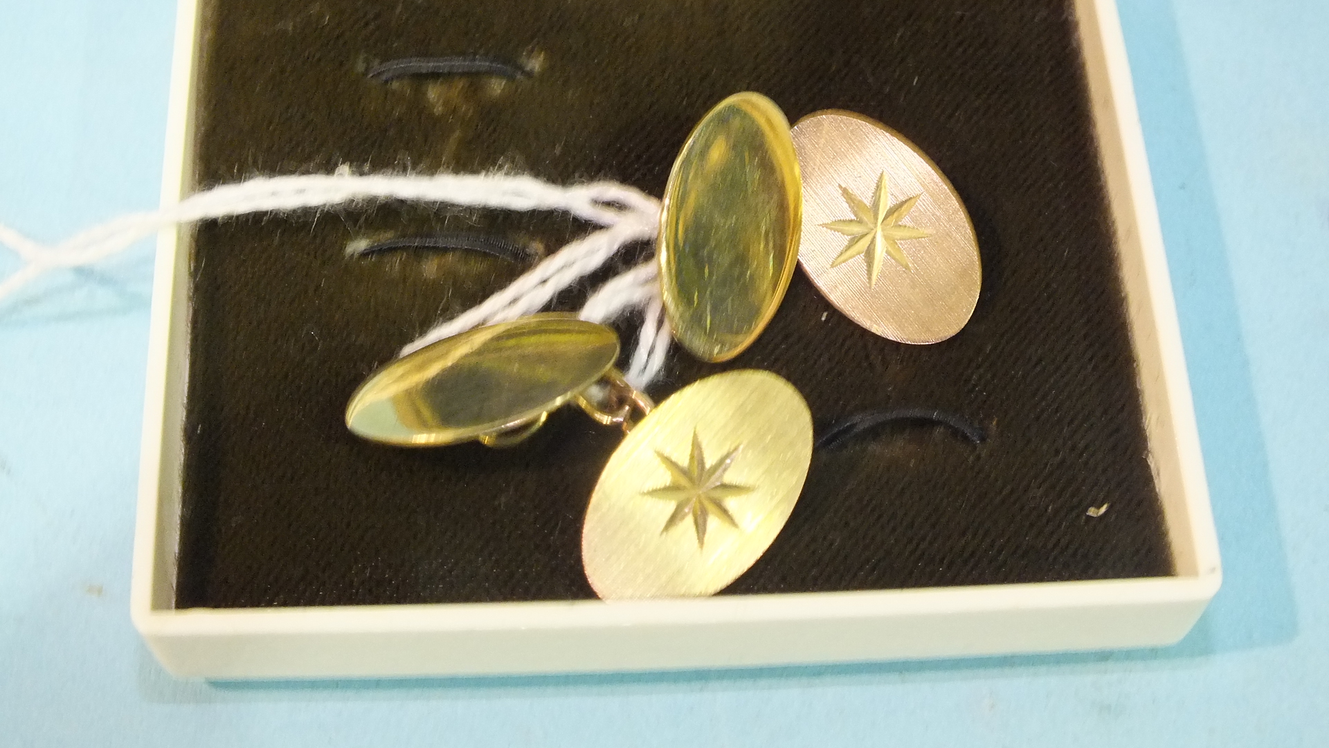 A pair of 9ct gold cufflinks, 6.9g, boxed.