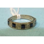 An 18ct white gold half-eternity ring set diamond points and sapphires, size I½, 3.7g.