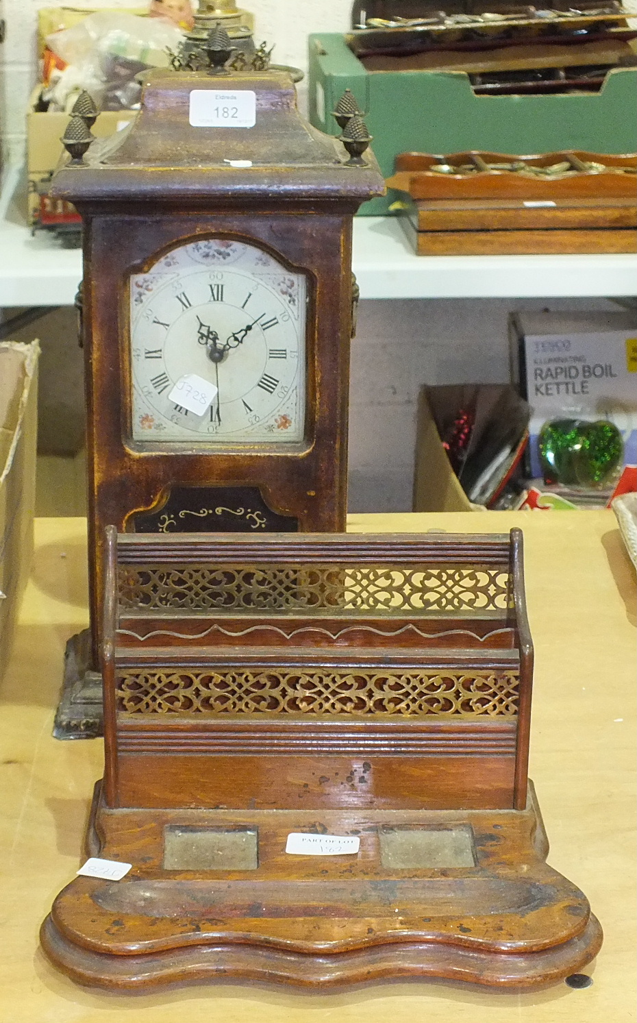A stained wood mantel clock, an oak stationery rack, a hat stretcher, metalware and miscellaneous