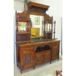 A Late-Victorian walnut sideboard, the back with central bevelled rectangular mirror flanked by