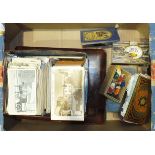 A collection of bone and wood lace bobbins, various postcards and other collectable items.