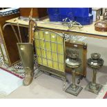 A leaded light and brass fire screen, a boot stick stand, two oil lamps and other items.