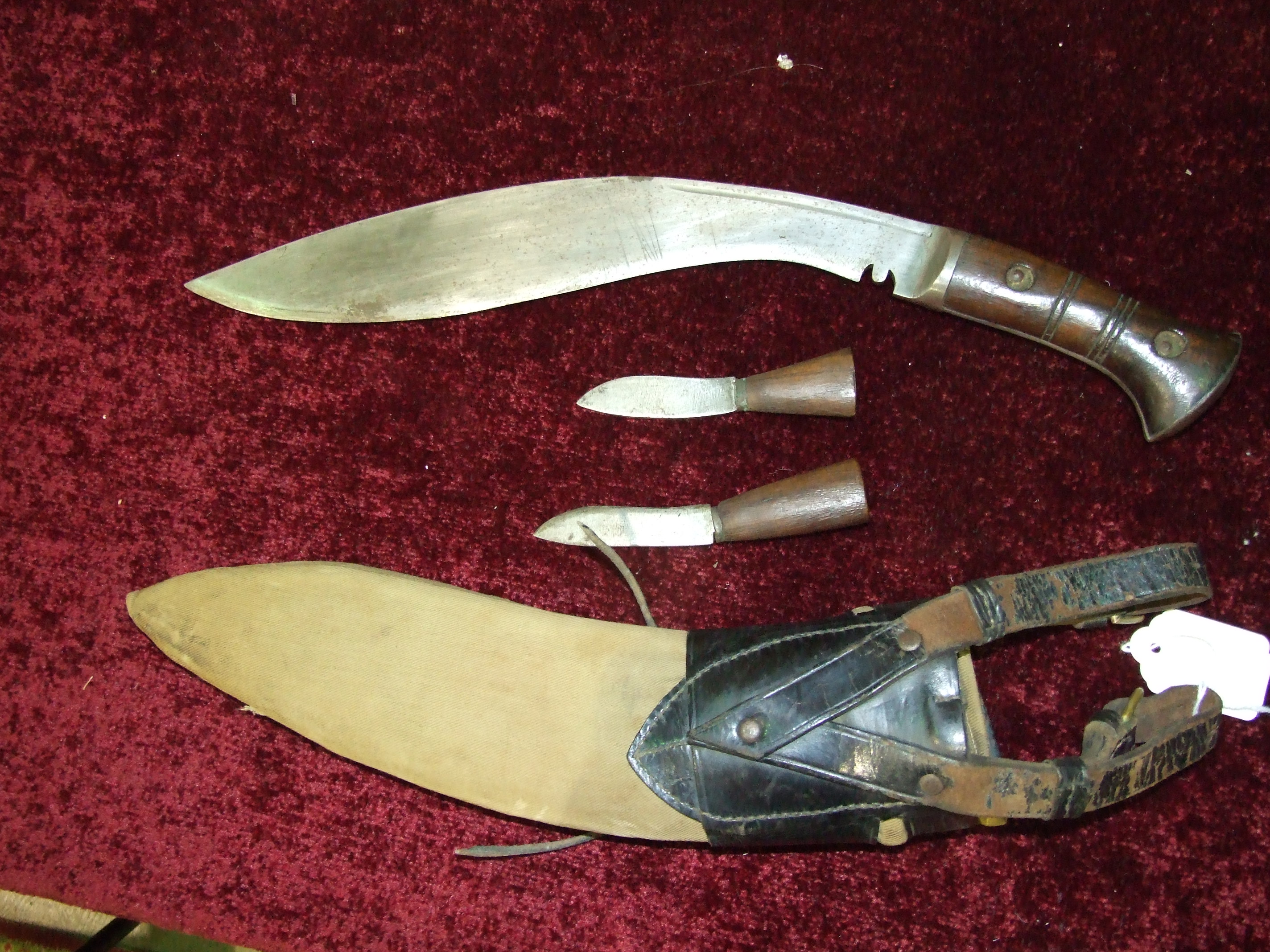 A wood-handled kukri knife with leather-bound canvas scabbard, two bayonets and other items. - Image 4 of 4