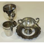 A small quantity of silver, comprising a goblet, small trophy cup, beaker and butter dish (no