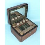 A Victorian ladies burr walnut dressing case fitted with seven plated-mount bottles and trinket