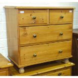 A stripped pine straight-front chest of two short and two long drawers, on short legs, 79cm wide,