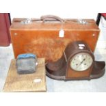 A mahogany and walnut mantel clock, a quantity of books, a leather suitcase and miscellaneous