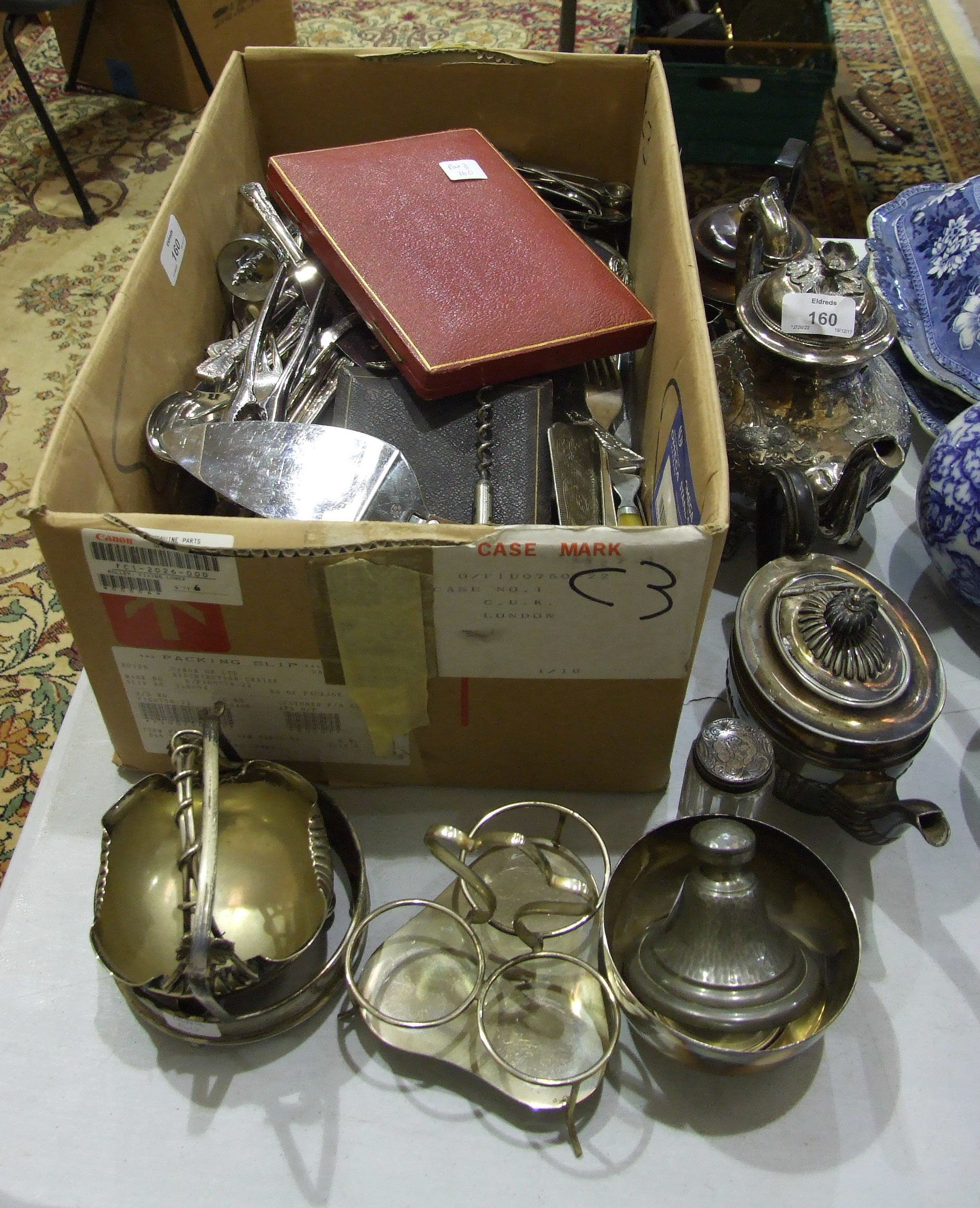 A quantity of plated cutlery and other plated items.