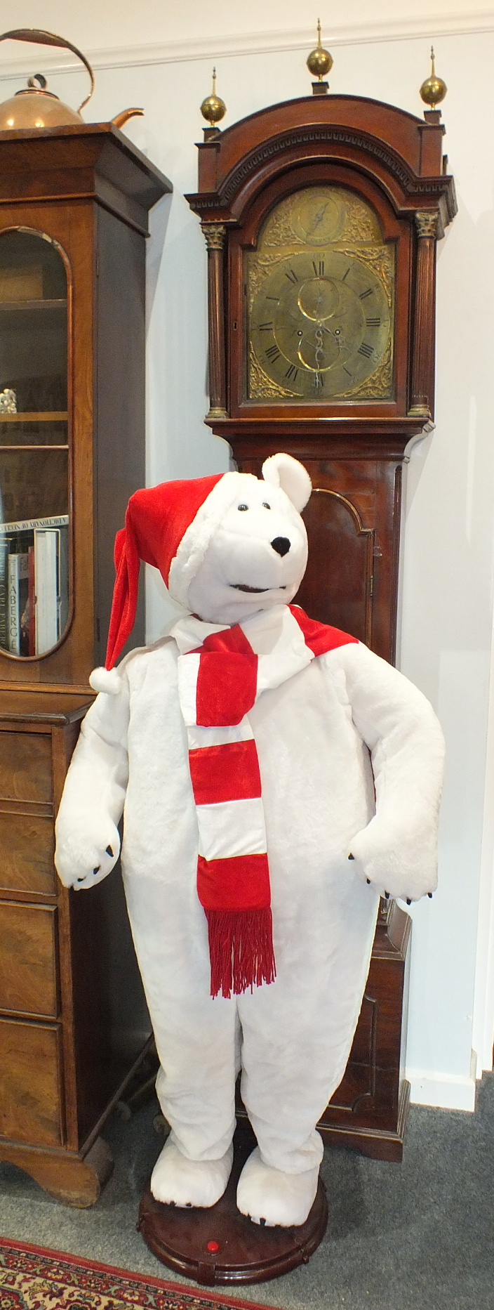 A novelty singing and dancing Christmas polar bear with motion sensor, 158cm high approximately.