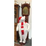 A novelty singing and dancing Christmas polar bear with motion sensor, 158cm high approximately.