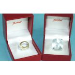 Baccarat, a clear glass bombe ring and a pale blue glass ring, both signed and boxed, (2), sizes J