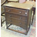 A mid-20th century oak chest of three drawers, on twist supports united by stretchers, 76cm wide,