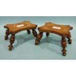 A pair of burr walnut treen trivets, each concave shape top on four turned splayed legs, 16cm