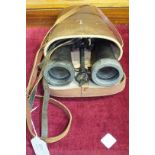 A pair of Barr & Stroud military field glasses in leather case.
