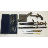 A World War II German SA dagger and sheath, a collection of drawing instruments and other items.