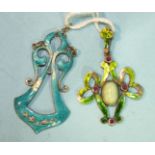 An Art Nouveau green-enamelled white metal pendant set jade cabochon and four rubies, (a/f) and an