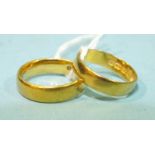 Two 22ct gold wedding bands, size K and L, 8.5g, (2).