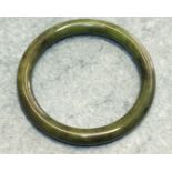 A green jade bangle, interior diameter 6cm.