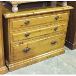 A modern pine straight-front chest of three graduated drawers, 88cm wide.