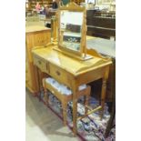A modern pine rectangular-top two-drawer dressing table on turned legs, 91cm, a matching dressing